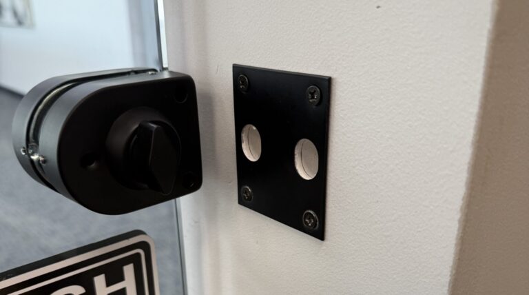 Glass door lock and strike plate installed in Bixby