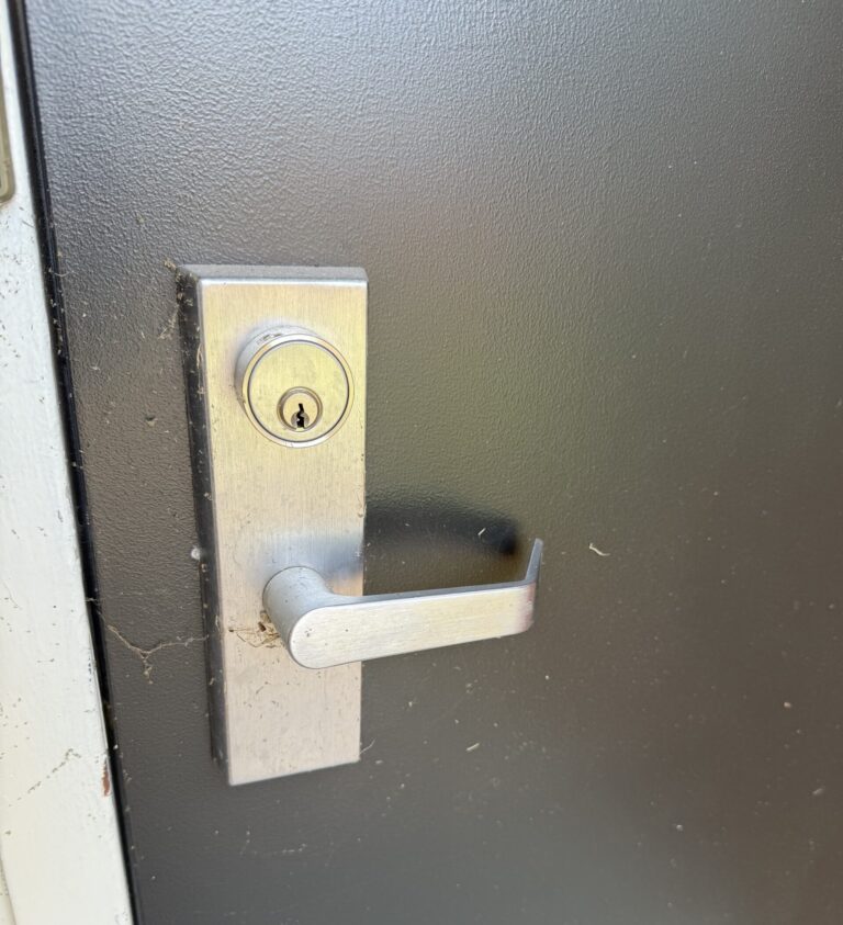 Commercial door lever and key cylinder serviced by Fortress Lock & Safe in Sand Springs