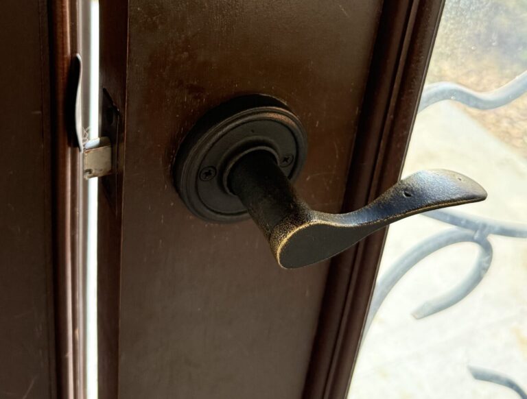 Front door lever and deadbolt after lock spring assembly repair in Broken Arrow